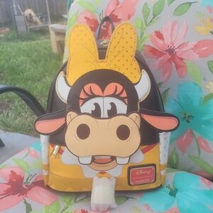 SOLD Nwt Disney limited edition clarabelle the cow cosplay mini backpack